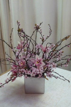 Blooming Love centerpiece Share Cherry Blossom with pink cymbidium orchids 