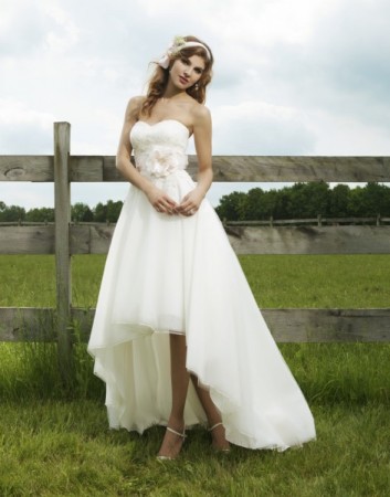 Sincerity Bridal This stunning wedding gown features a hilo bottom with a 