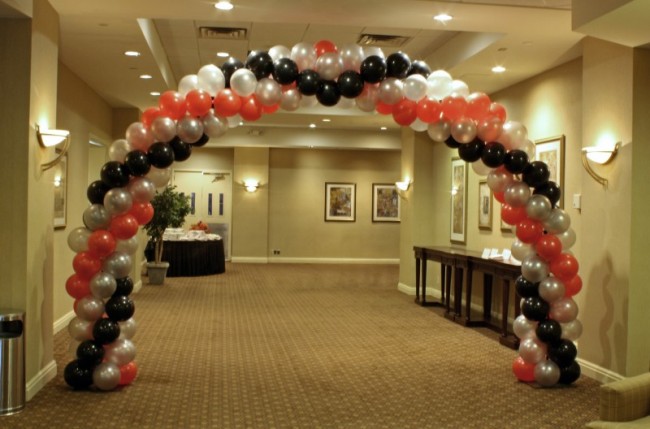 This unique party decorations features red white black and silver balloons 