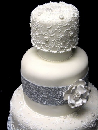 Silver and Delicate Lace Wedding Cake A combination silver texture ribbon