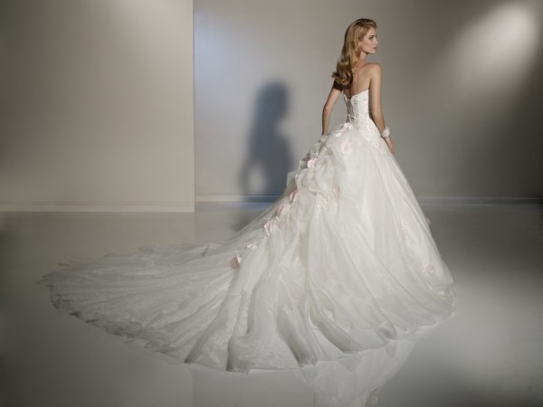 A stunning wedding gown with an amazing train