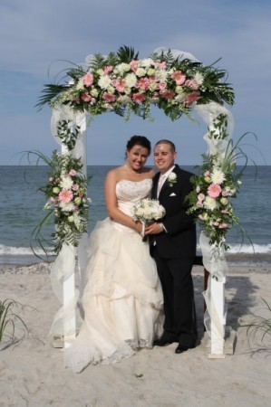 Beautiful Beach Wedding with a Floral Arch