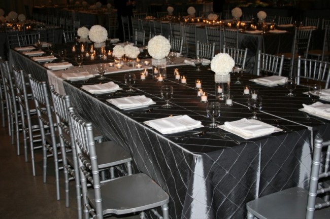 Silver chairs decorative silver beading and platinum silver tablecloths 