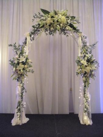 Beautiful White Wedding Arch with White Flowers