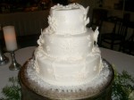 Elegant Buttercream Wedding Cake With Fondant Accents