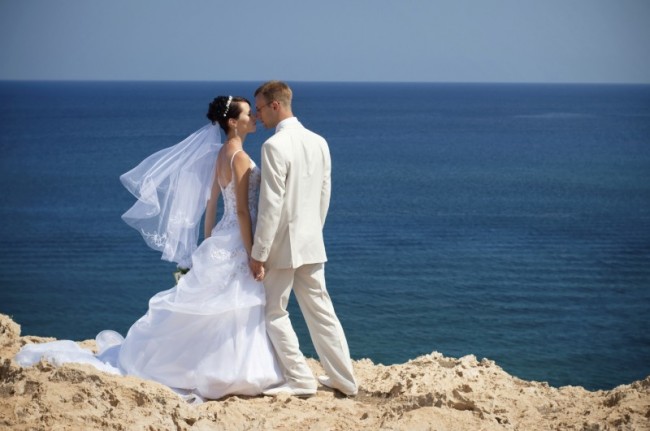 An oceanside cliff wedding in Greece.