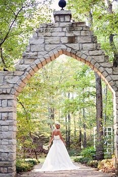 Bride at stone archway