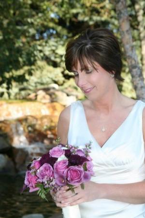 Bride Holding Purple Wedding Bouquet