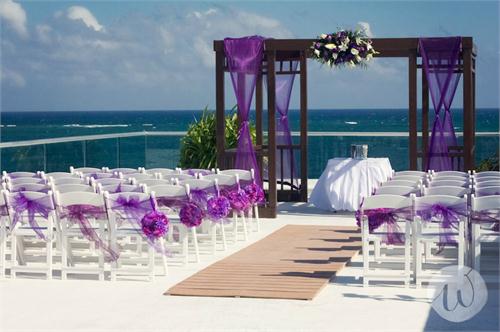 This pleasing purple wedding ceremony set up is offered at the Azul Sensatori Hotel in Riviera Maya, Mexico