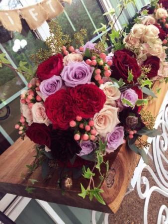 Deep lavender and red bouquet