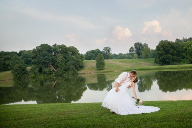 bride & groom by lake