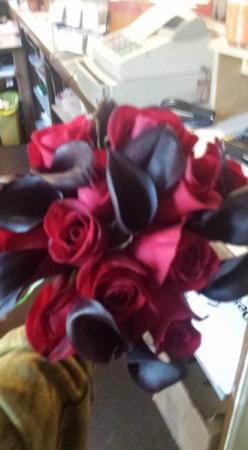 red roses with black accents 