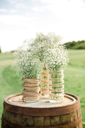 lace-and-burlap-country-wedding-ideas-with-babys-breath-and-wine-barrels.jpg