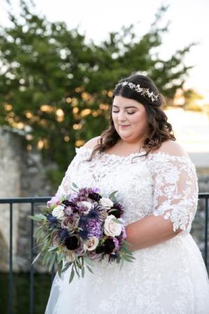 Bridal bouquets shades of white with purple accents