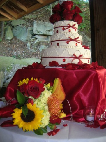Red Wedding Cake and Bridal Bouquet