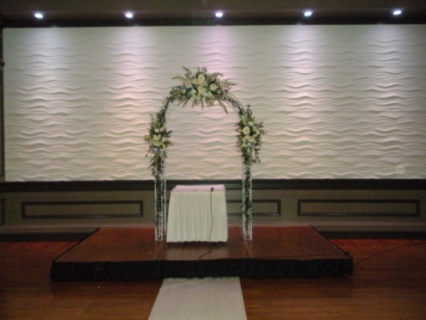 Lombardos Ceremony With Floral Arch