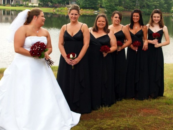 Bride with Lovely Bridesmaids All with Red Bouquets