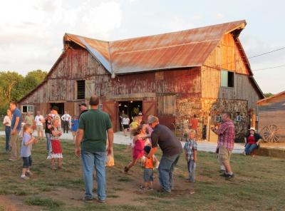 Guests In Barn Courtyard