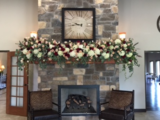 Gorgeous Flowers Above The Fireplace 