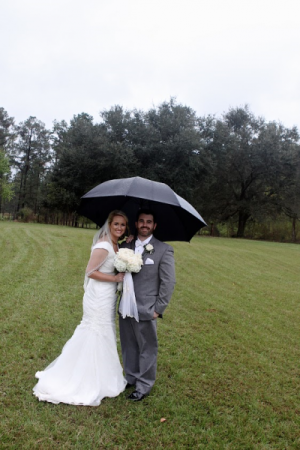 Bride and Groom under an Umbrella