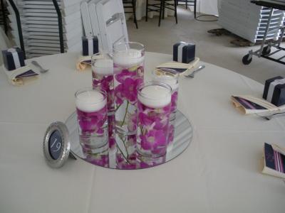Various Vases with Floating Orchids